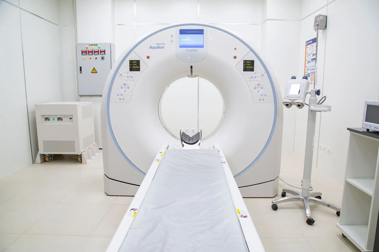 Stock photo of a CT scanner in an empty medical imaging room. Not the Quicktome DB product or a hospital using it.